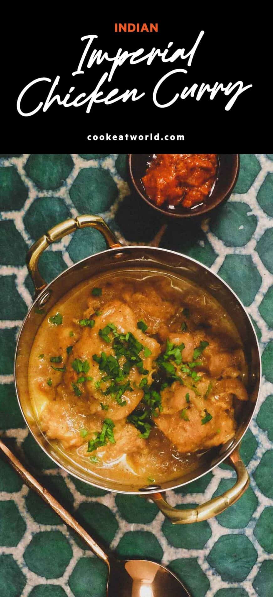 A small bowl of Imperial chicken curry with chutney on the side.