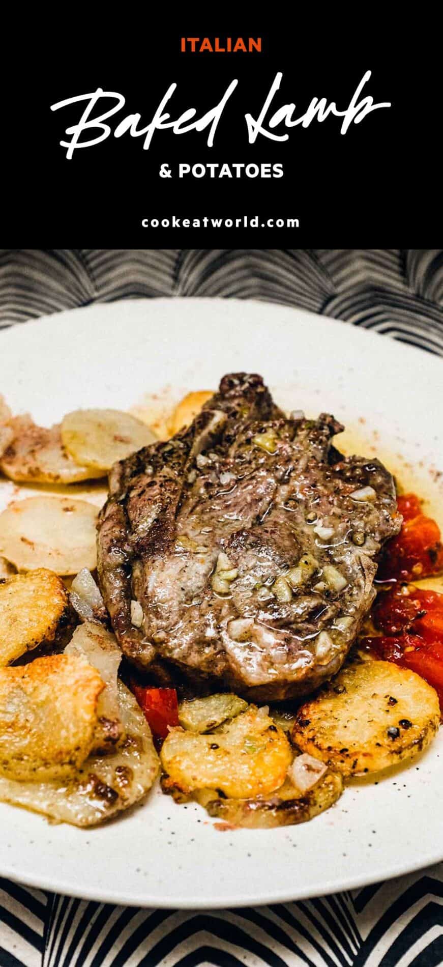 A plate of baked lamb with potatoes and tomatoes