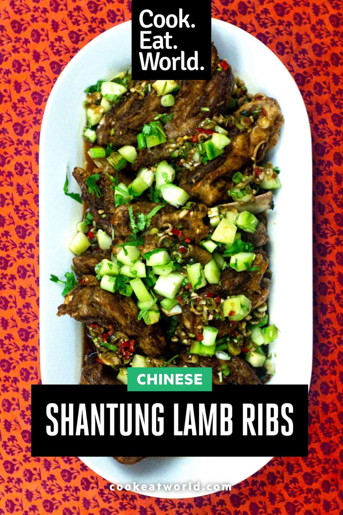 Shantung Lamb Ribs on a large platter on a red patterned background
