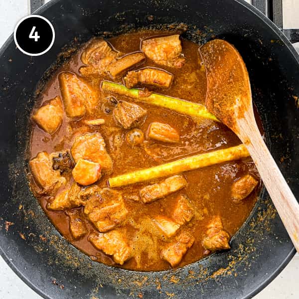 Gaeng Hung Lay (Northern Thai Pork Curry) | cookeatworld.com Gaeng Hung Lay pork curry simmering in a large pan