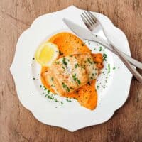 Pan fried fish on a bed of Spanish Romesco Sauce