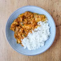 A bowl of chicken Peratal curry with rice