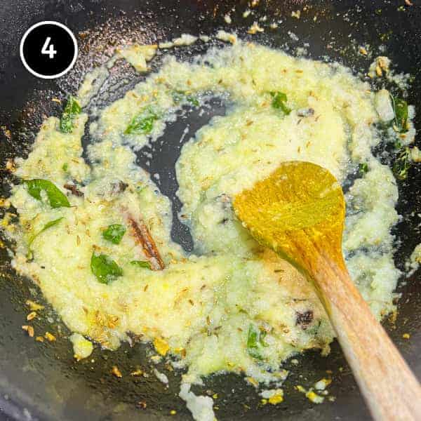 onion and aromatics frying in a pan