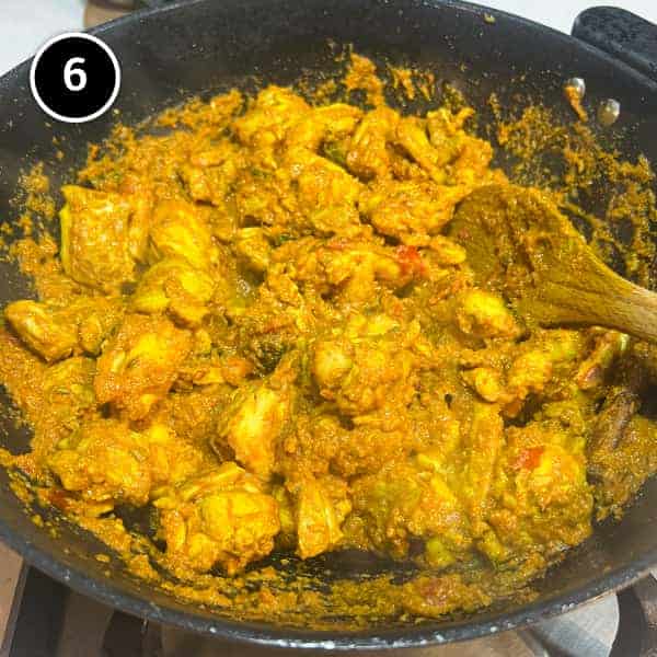 Chicken peratal simmering in a pan