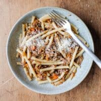 A bowl fo Pasta Alla Genovese with tubular pasta