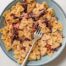 A bowl of farfalle pasta with a radicchio, pancetta and cheese sauce