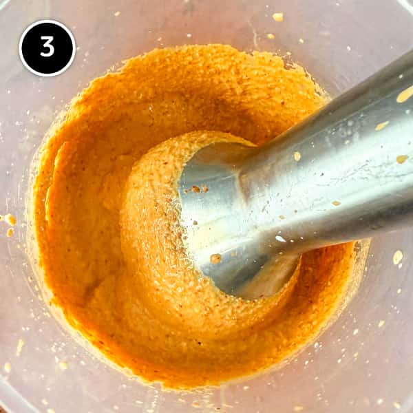 Andhra Chicken | cookeatworld.com A creamy chilli paste is mixed with a stick blender