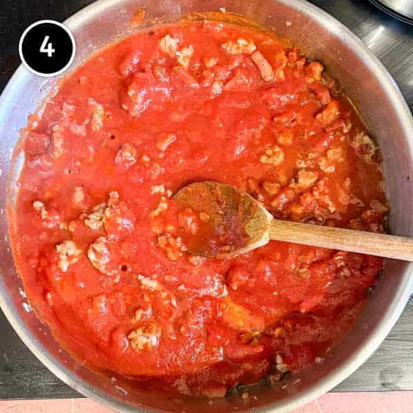 Pasta Alla Zozzona – cookeatworld.com a tomato sauce in a pan