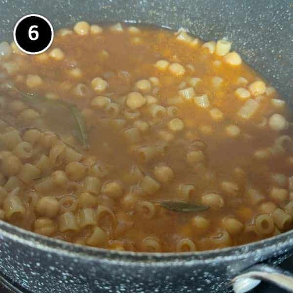 Pasta e Ceci – Italian Pasta with Chickpeas | cookeatworld.com The pasta e ceci simmering in a pot