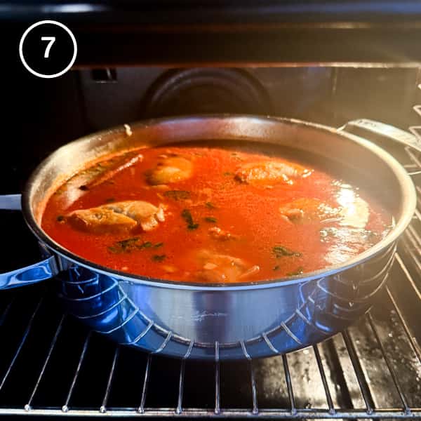 Chicken Youvetsi (Greek Chicken and Orzo Bake) | cookeatworld.com Youvetsi Chicken is placed in the oven to bake.