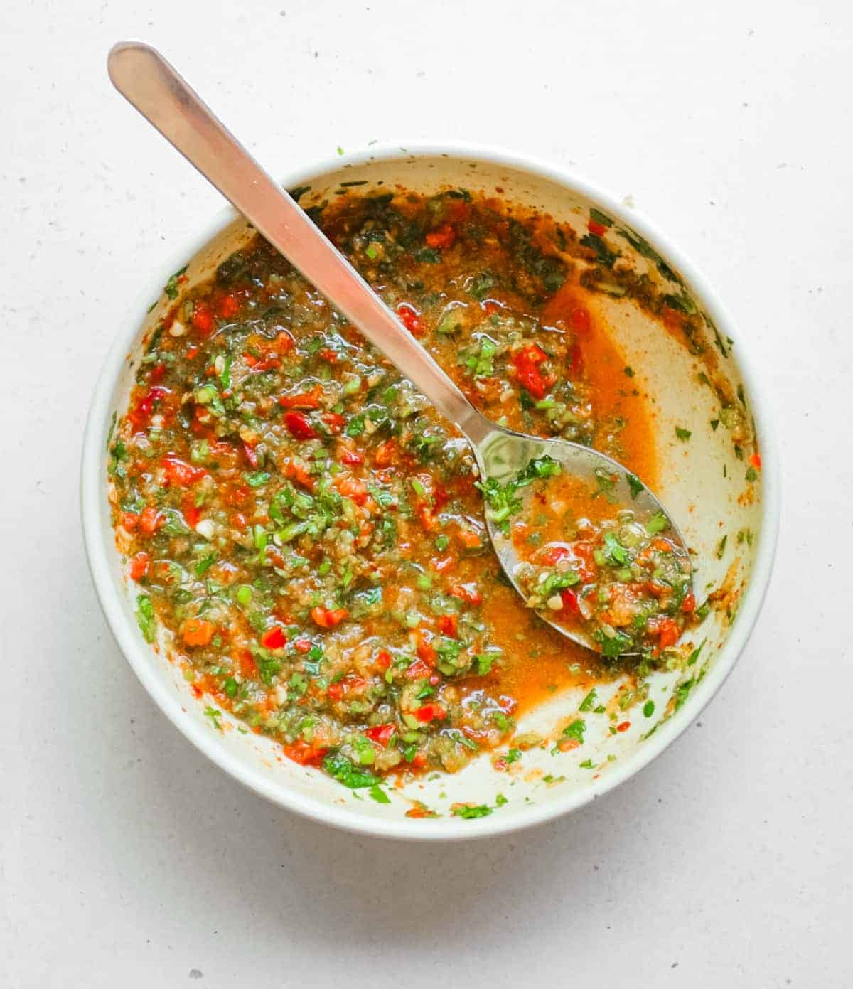 The lemon, chilli and herb dressing for batata harra