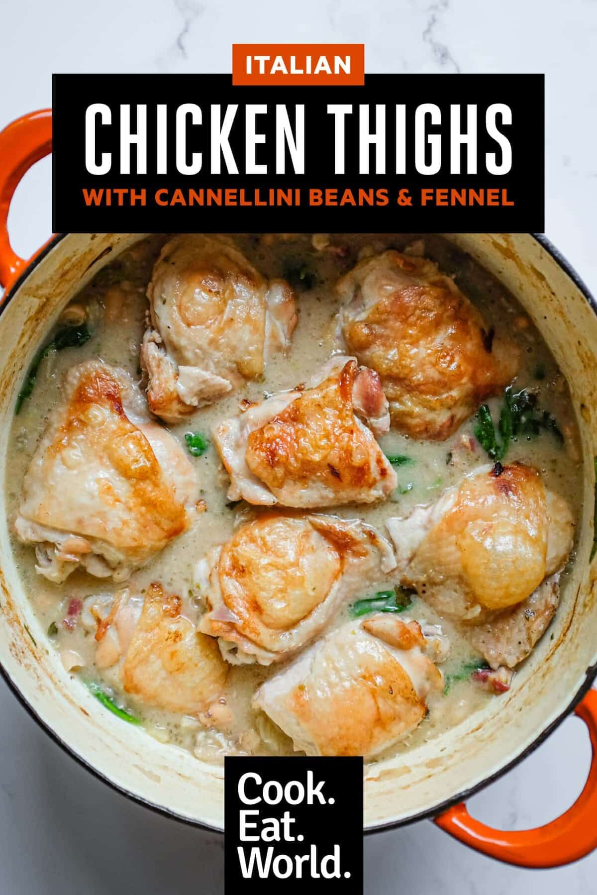 Large pan filled with golden roasted chicken thighs resting on creamy cannellini beans and fennel.