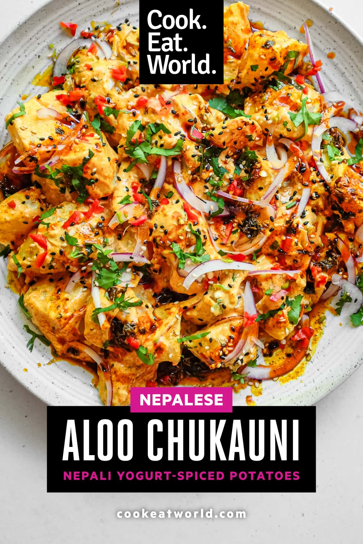 A platter of creamy Aloo Chukauni, a Nepali potato and yoghurt salad garnished with a vibrant spiced oil