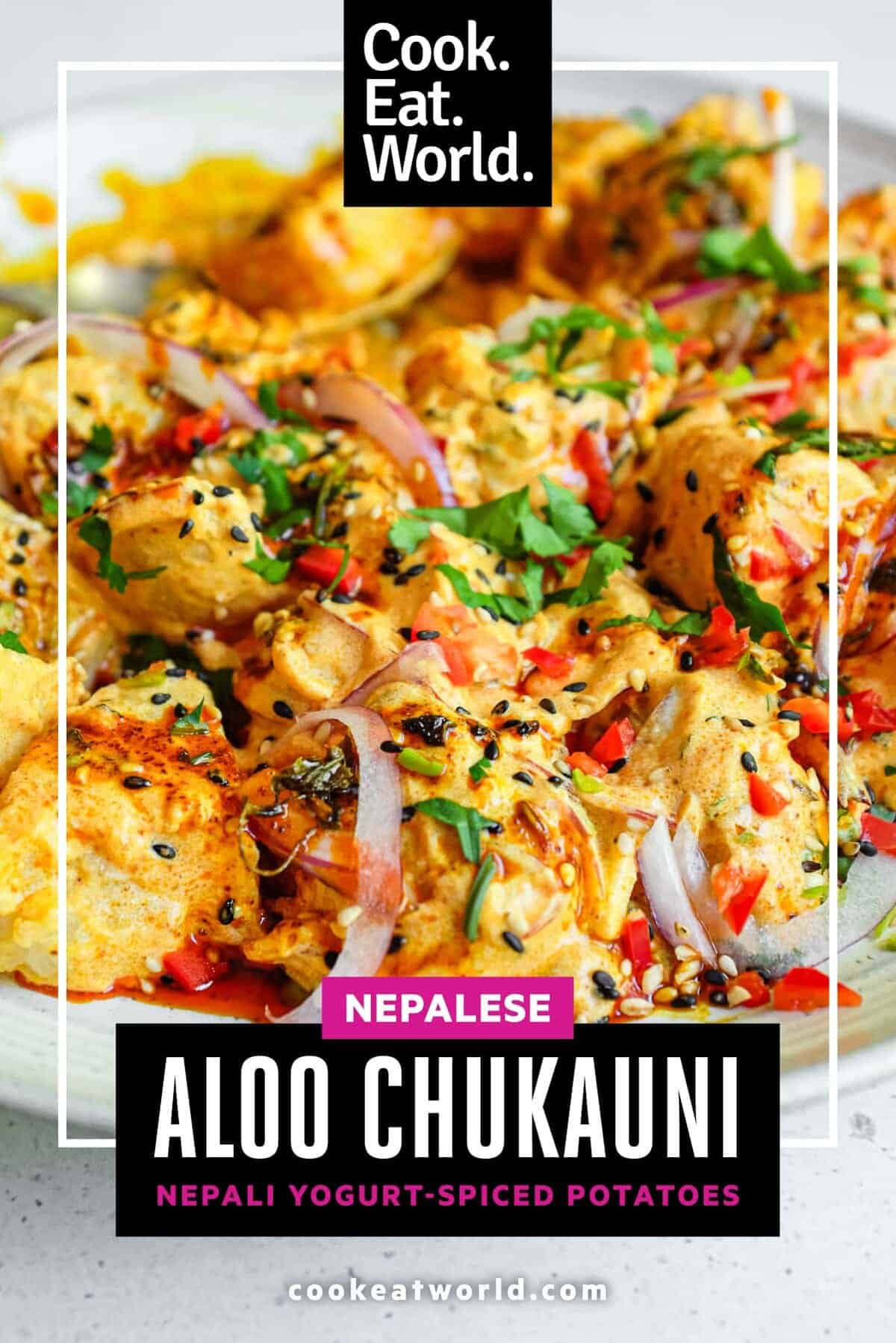 A platter of creamy Aloo Chukauni, a Nepali potato and yoghurt salad garnished with a vibrant spiced oil