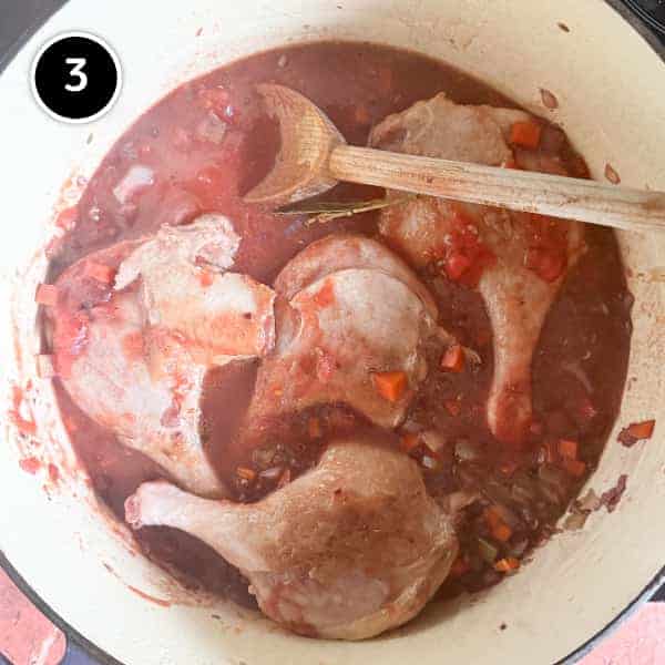 Duck Ragù with Pappardelle | cookeatworld.com the duck legs begin simmering in the sauce