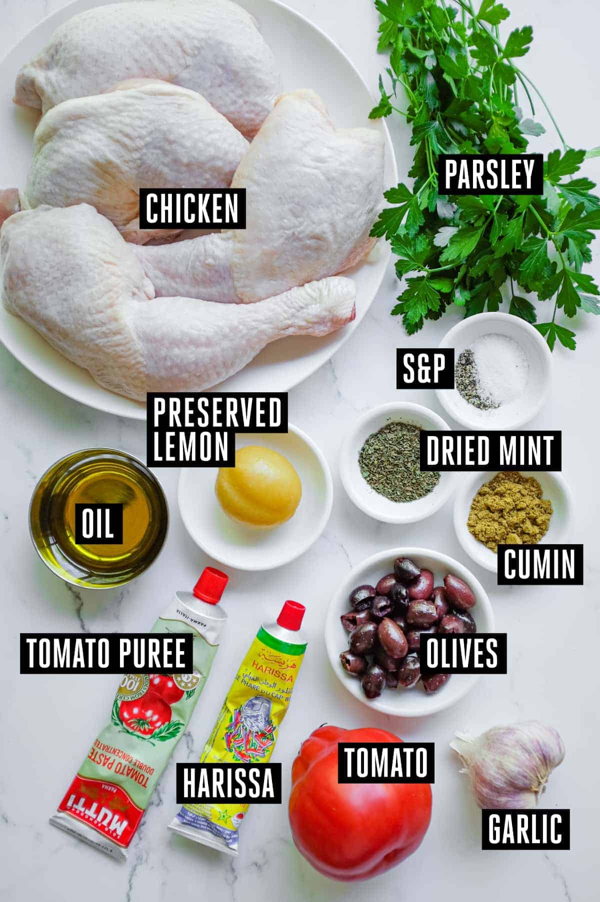 Harissa Chicken | cookeatworld.com The ingredients for Moroccan Harissa Chicken: Chicken, parsley, oil, preserved lemon, dried mint, salt & pepper, olives, tomato and tomato concentrate, harissa paste and garlic.