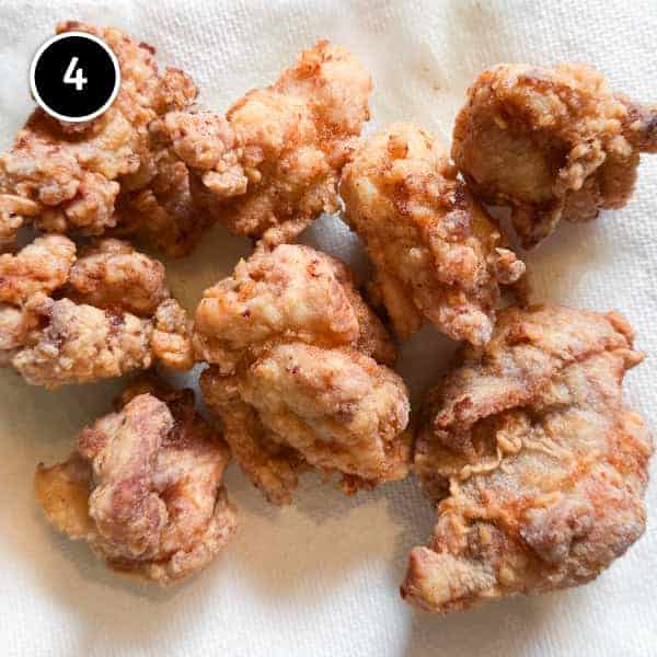 Karaage Chicken (Japanese Fried Chicken) | cookeatworld.com karaage chicken on paper towels.