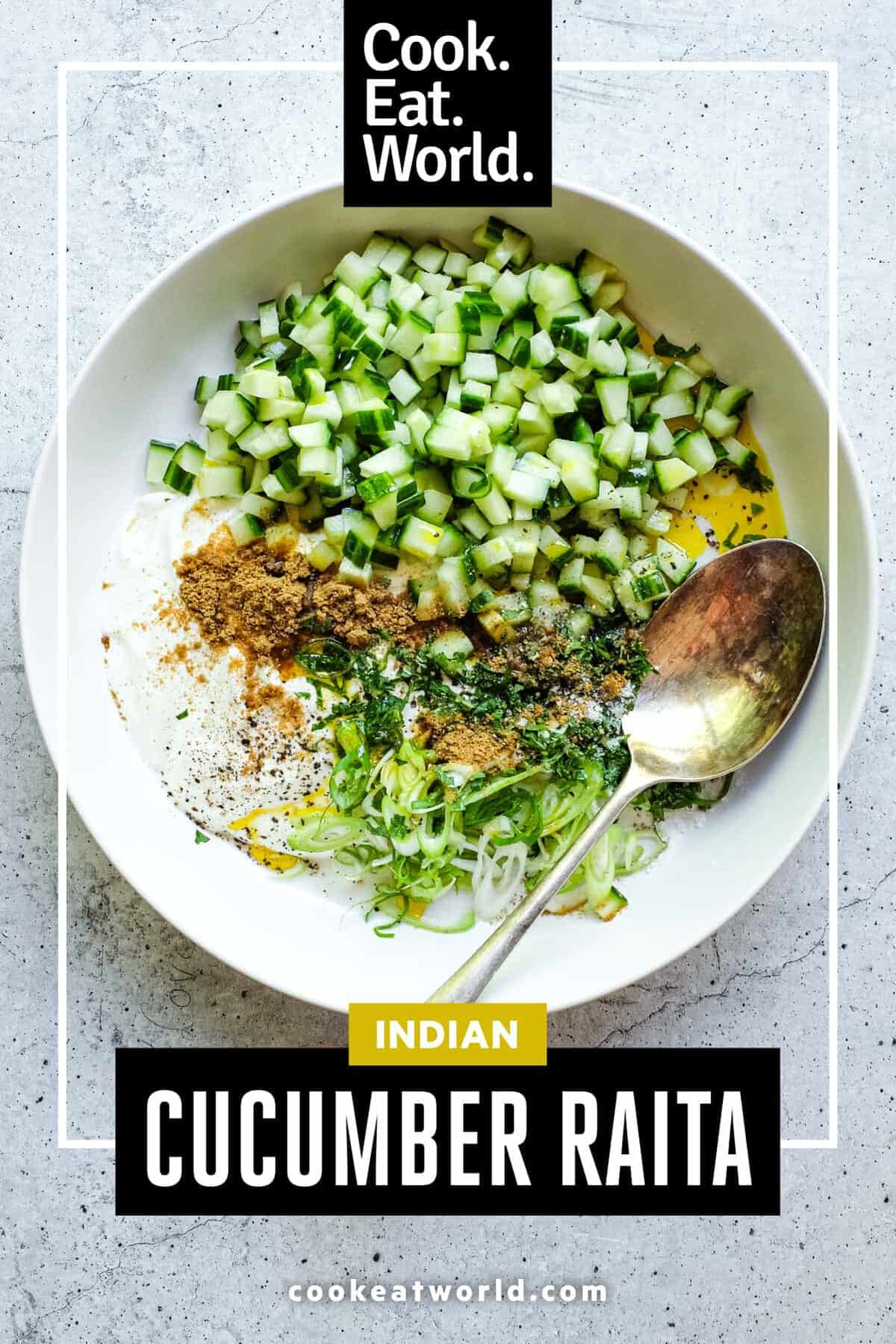 Fresh yoghurt raita with cucumber, herbs and mustard oil served in a small bowl