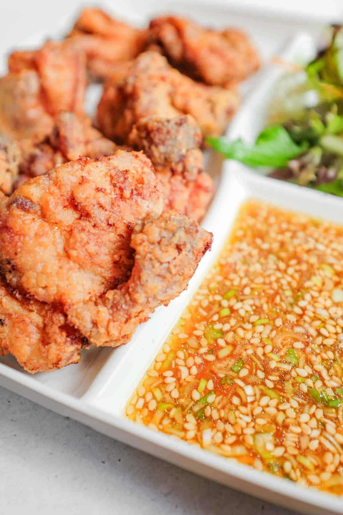 Yurinchi chicken, a combination of crisp fried chicken, yurinchi sauce and salad.