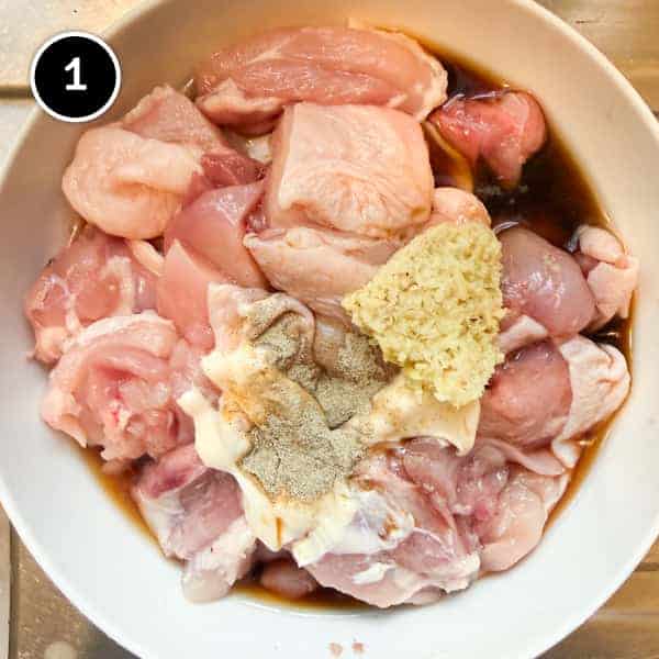 Yurinchi Chicken (Crispy Fried Chicken with Soy Vinegar Sauce) The chicken marinating in aromatics for yurinchi chicken