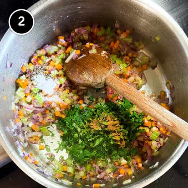 Gigantes Plaki (Quick & Easy Greek Beans in Tomato Sauce) | cookeatworld.com Herbs added soft onions, the base for Greek gigantes plaki (beans in tomato sauce).