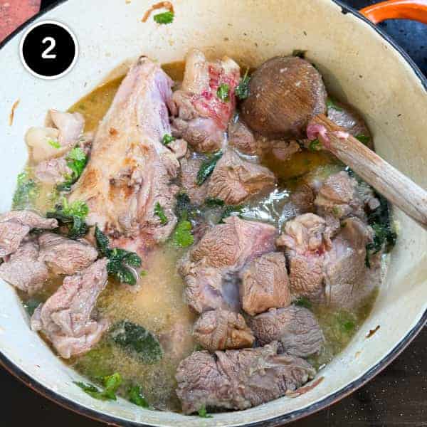 Hyderabadi Haleem (Lamb & Lentil Stew) | cookeatworld.com Lamb is slowly cooked with spices and herbs in a large pot.