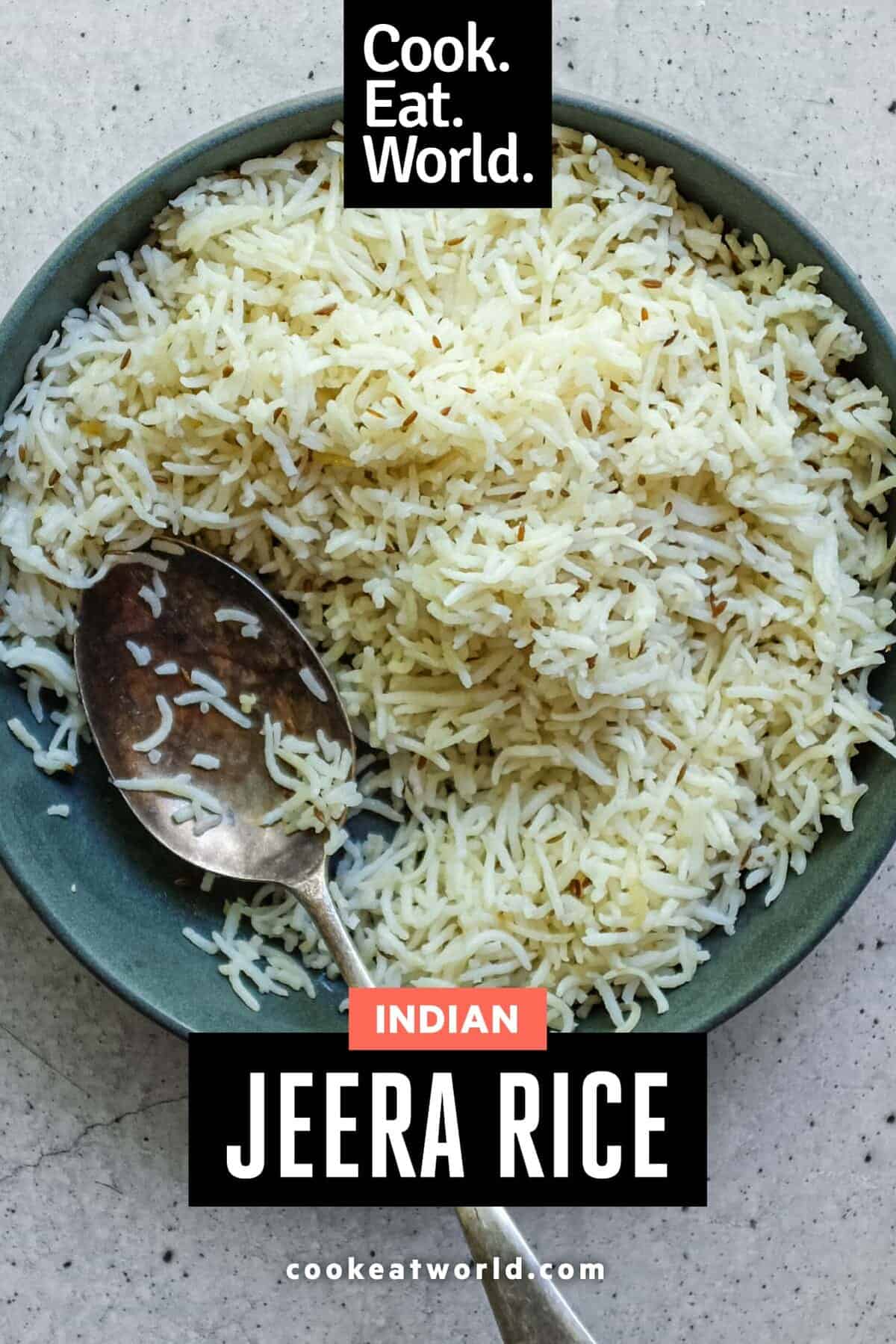 Freshly cooked basmati jeera rice with whole spices and glossy grains