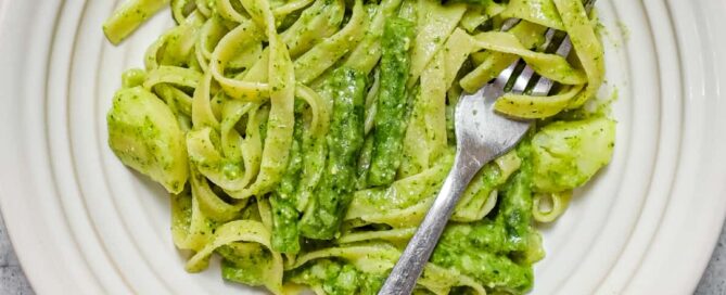Italian pasta with basil pesto, potatoes and green beans
