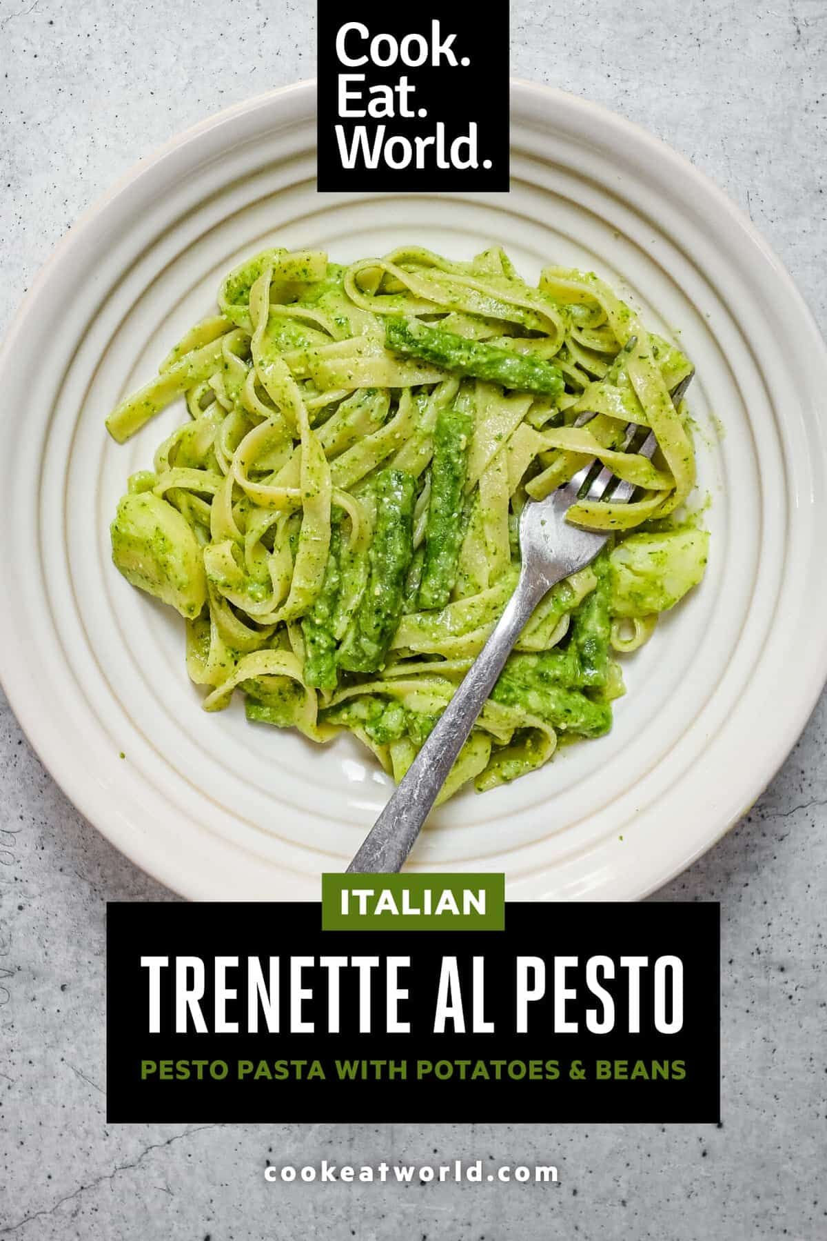 Plate of pesto pasta with tender potatoes and fresh green beans