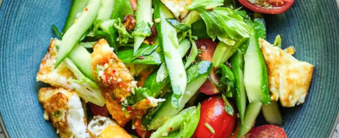 Thai crispy fried egg salad with herbs and chilli dressing