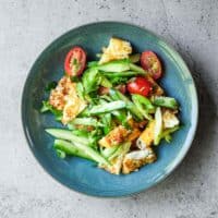 Thai egg salad with crispy edges and fresh coriander