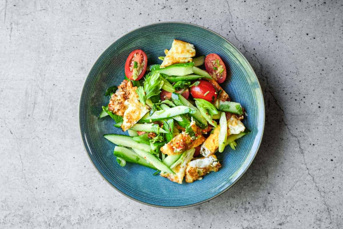 Thai egg salad with crispy edges and fresh coriander