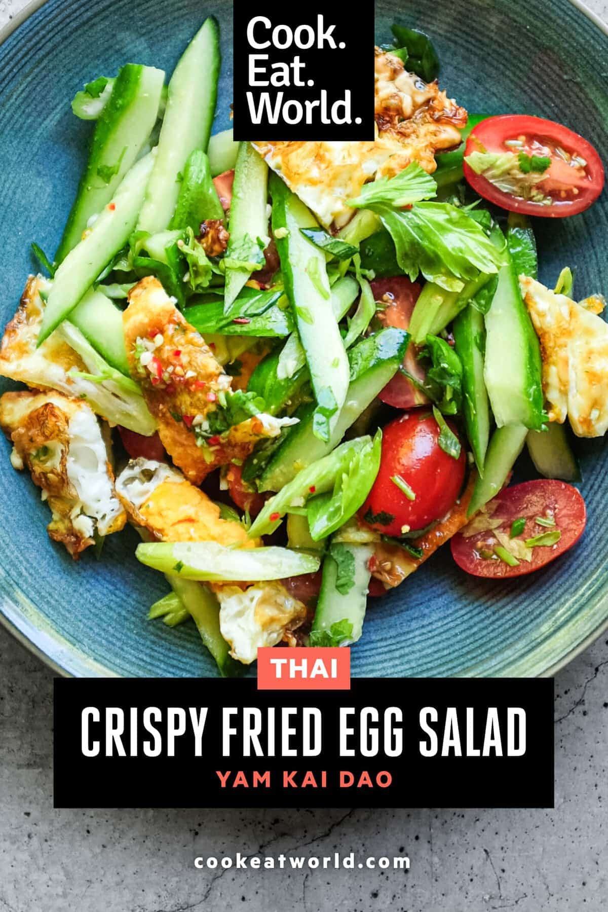 Overhead view of Thai crispy fried egg salad in bowl