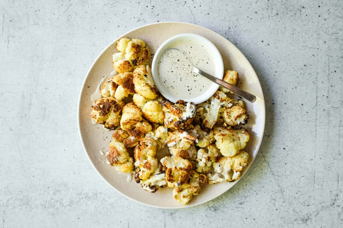 Charred cauliflower florets with smooth tahini dressing