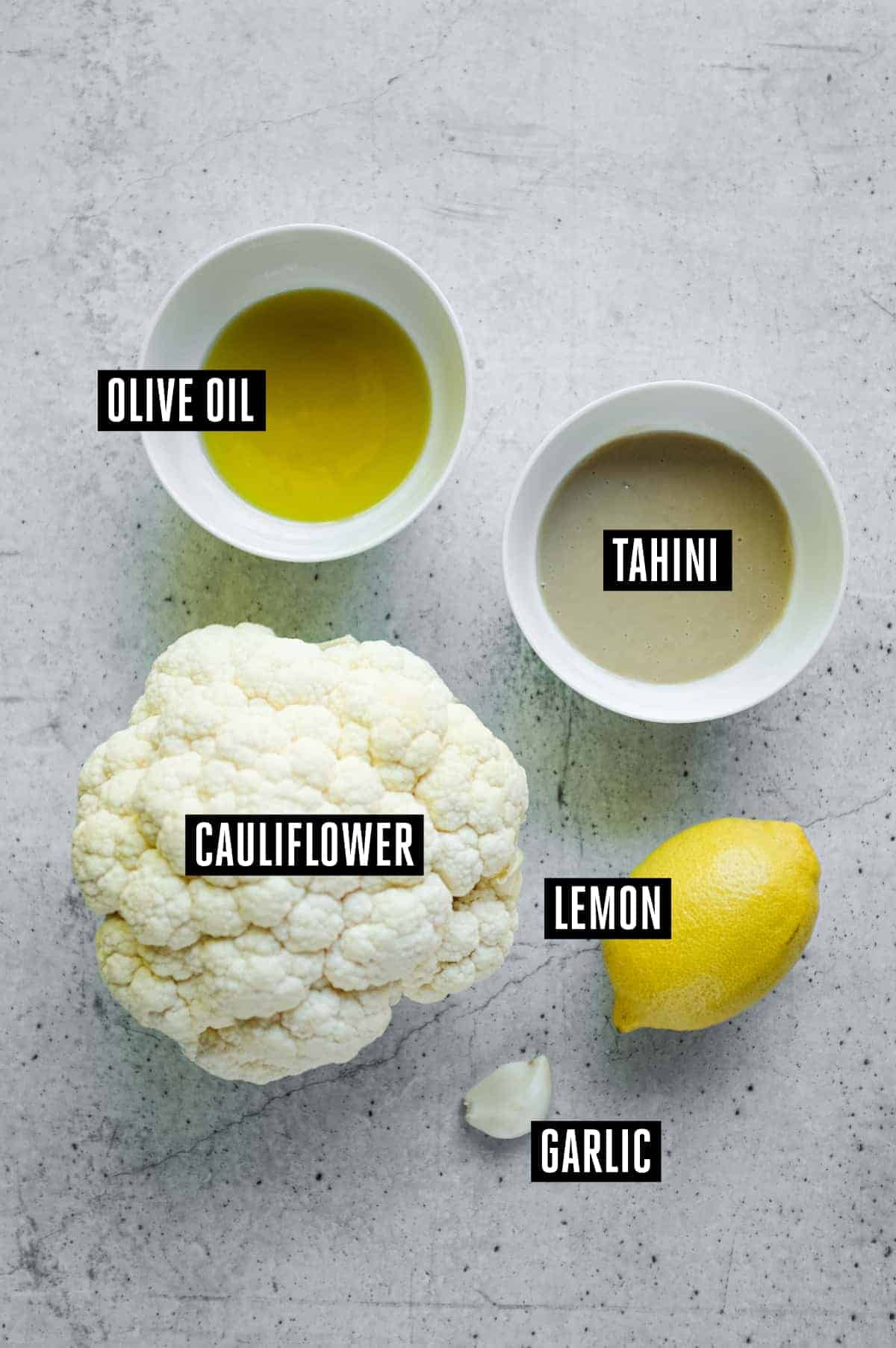 Lebanese Cauliflower with Tahini (Arnabeet b’Tahini) | cookeatworld.com The ingredients for Lebanese roasted cauliflower with tahini sauce: Cauliflower, Tahini, Garlic, Lemon, and olive oil.