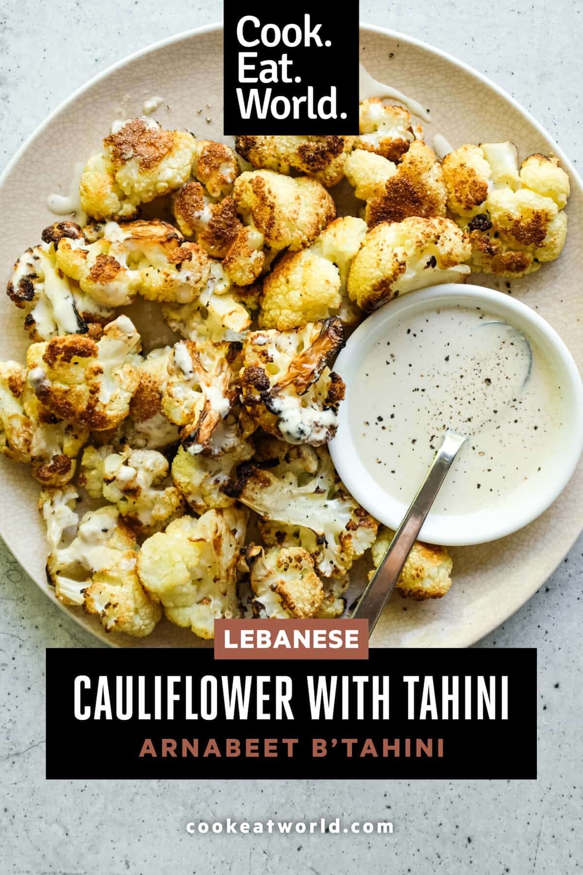 Levantine cauliflower with tahini sauce and lemon on a serving plate