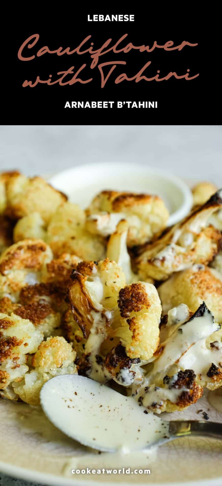 Roasted cauliflower with creamy tahini sauce served on a plate
