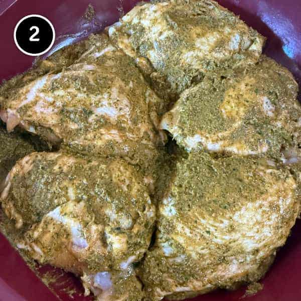 Moroccan Chermoula Chicken | cookeatworld.com chicken thighs marinating in the chermoula sauce.