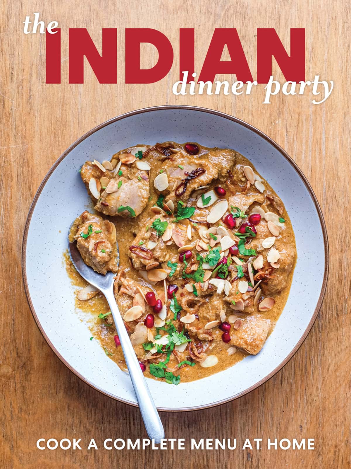Indian dinner party book cover featuring a rich Mughlai chicken curry in a creamy sauce, garnished with herbs and spices.