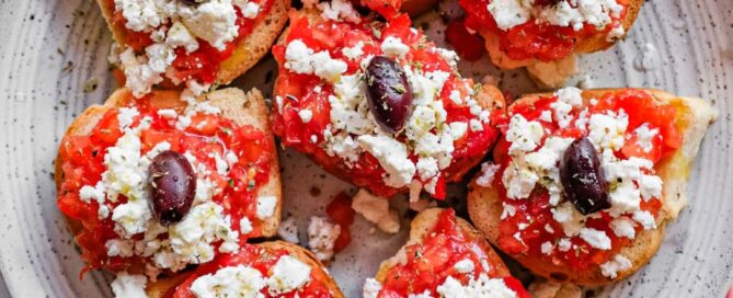 Mediterranean mezze dish of dakos with tomato, feta and crunchy rusks