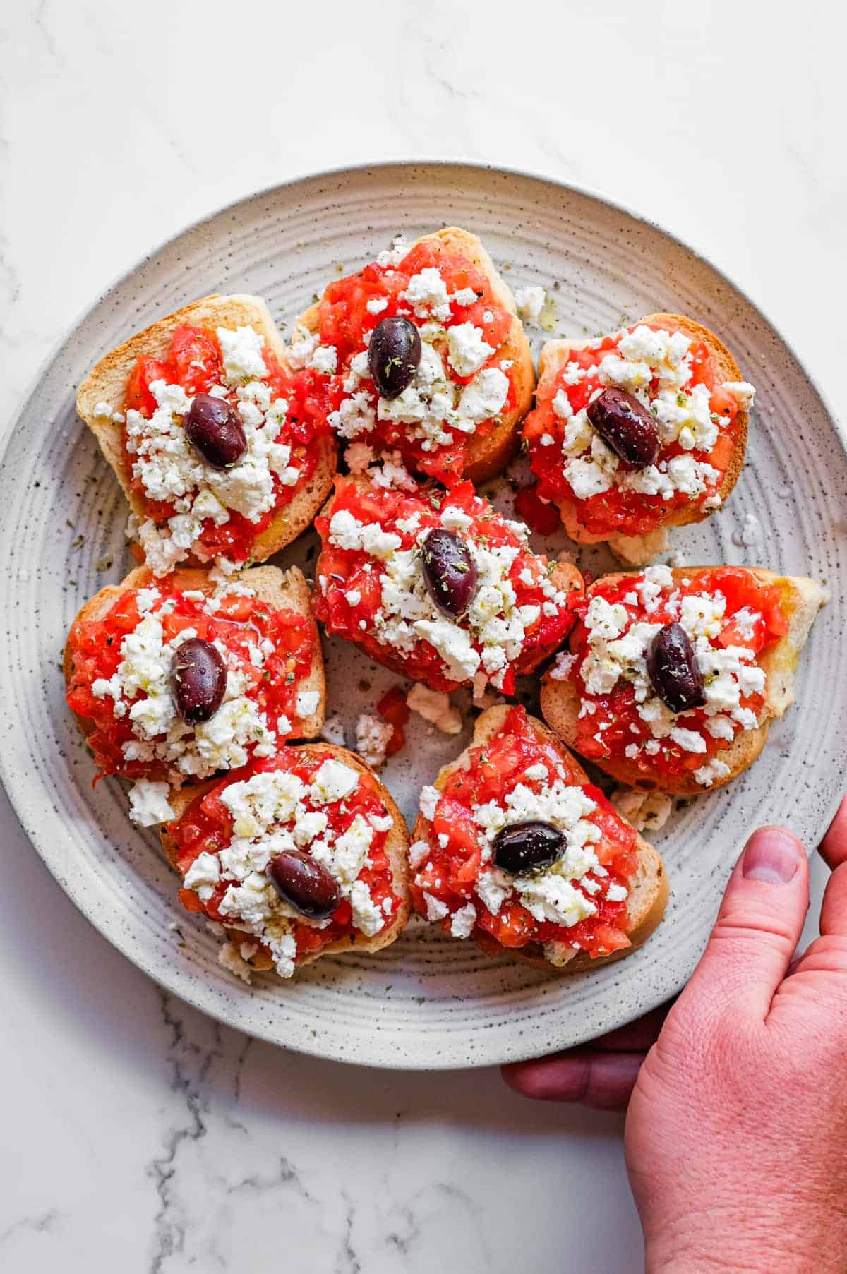 Cretan Dakos Salad | cookeatworld.com Mediterranean mezze dish of dakos with tomato, feta and crunchy rusks
