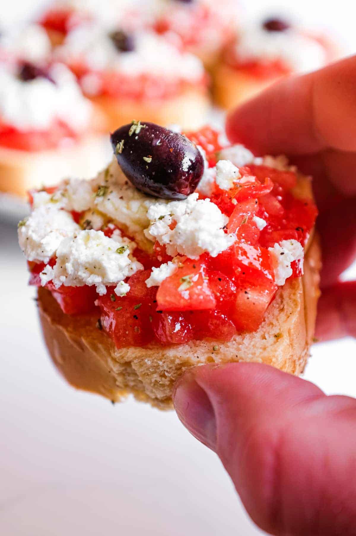Cretan Dakos Salad | cookeatworld.com Fresh and rustic dakos topped with tomato, feta and extra virgin olive oil