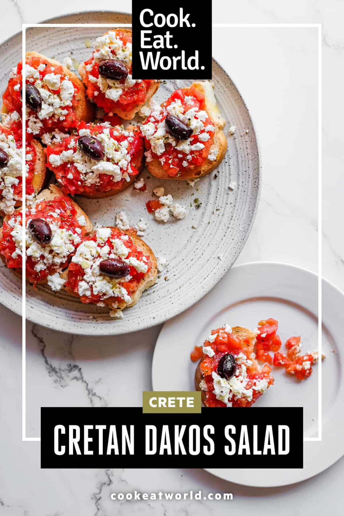Traditional Greek dakos with ripe tomatoes, oregano and creamy feta cheese