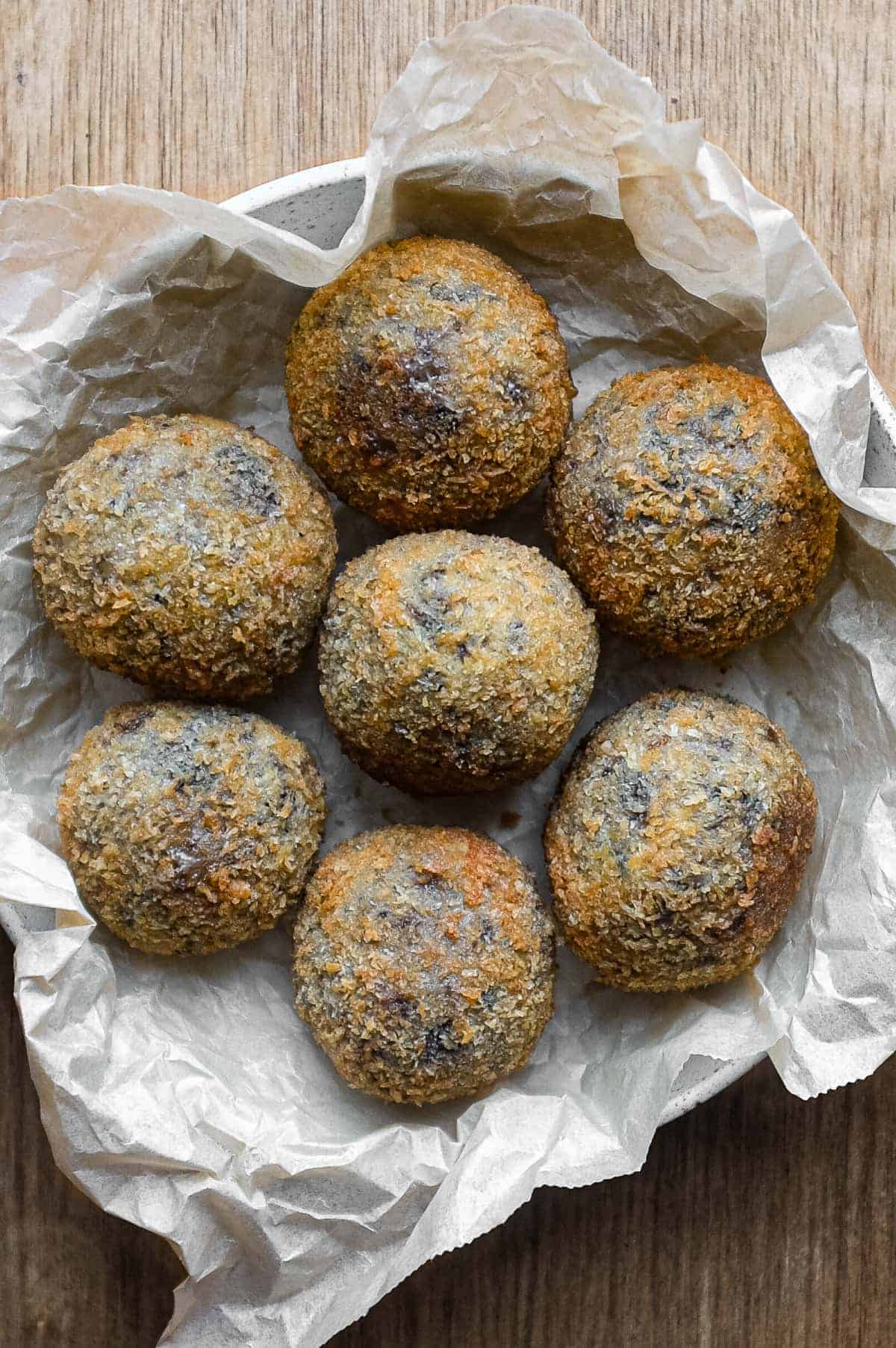 Mushroom Arancini (Crispy Italian Risotto Balls) | cookeatworld.com Italian mushroom arancini made with Carnaroli rice, Parmesan and mozzarella.
