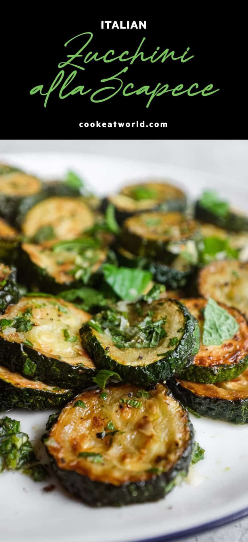 A serving platter of zucchini alla scapece with golden fried zucchini slices marinated in mint, garlic and white wine vinegar.
