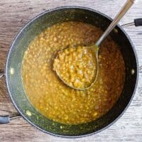 A ladleful of Persian lentil soup, adasi.