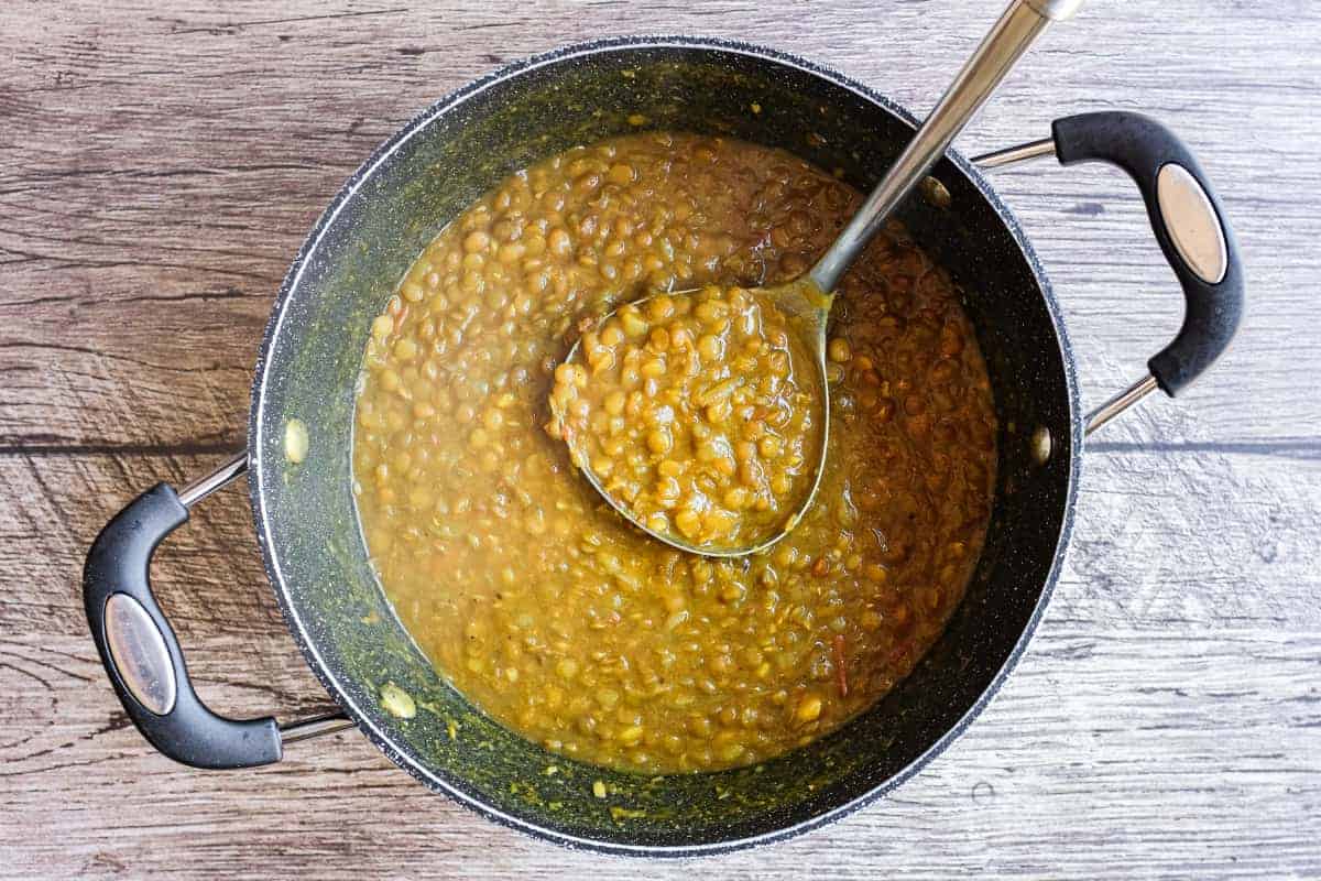 A ladleful of Persian lentil soup, adasi.