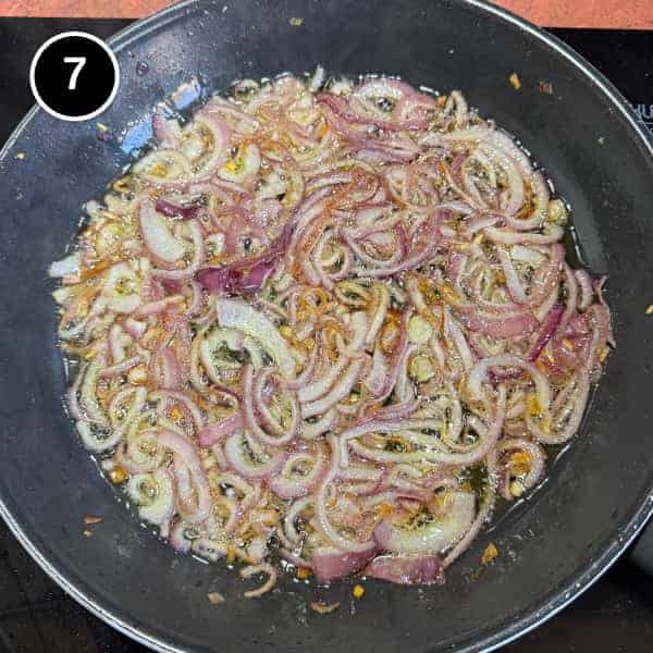 Adasi (Persian Lentil Soup) | cookeatworld.com onion slices frying until crisp in oil