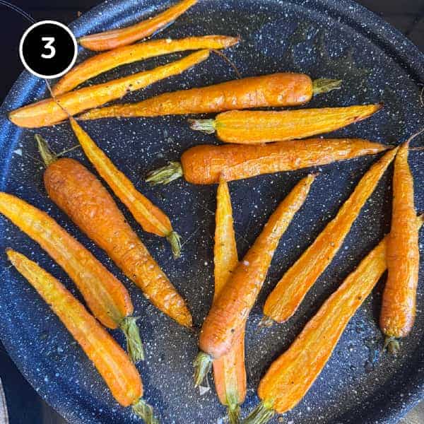Roasted Carrots with Labneh & Pistachios | cookeatworld.com Carrots going into the oven to be roasted for a Middle Eastern salad with labneh.