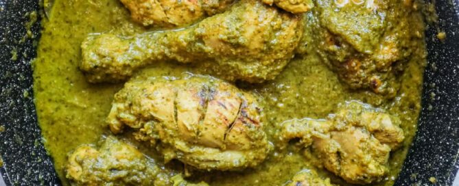 Juicy chicken coated in a vibrant green Chicken Cafreal masala from Goa.